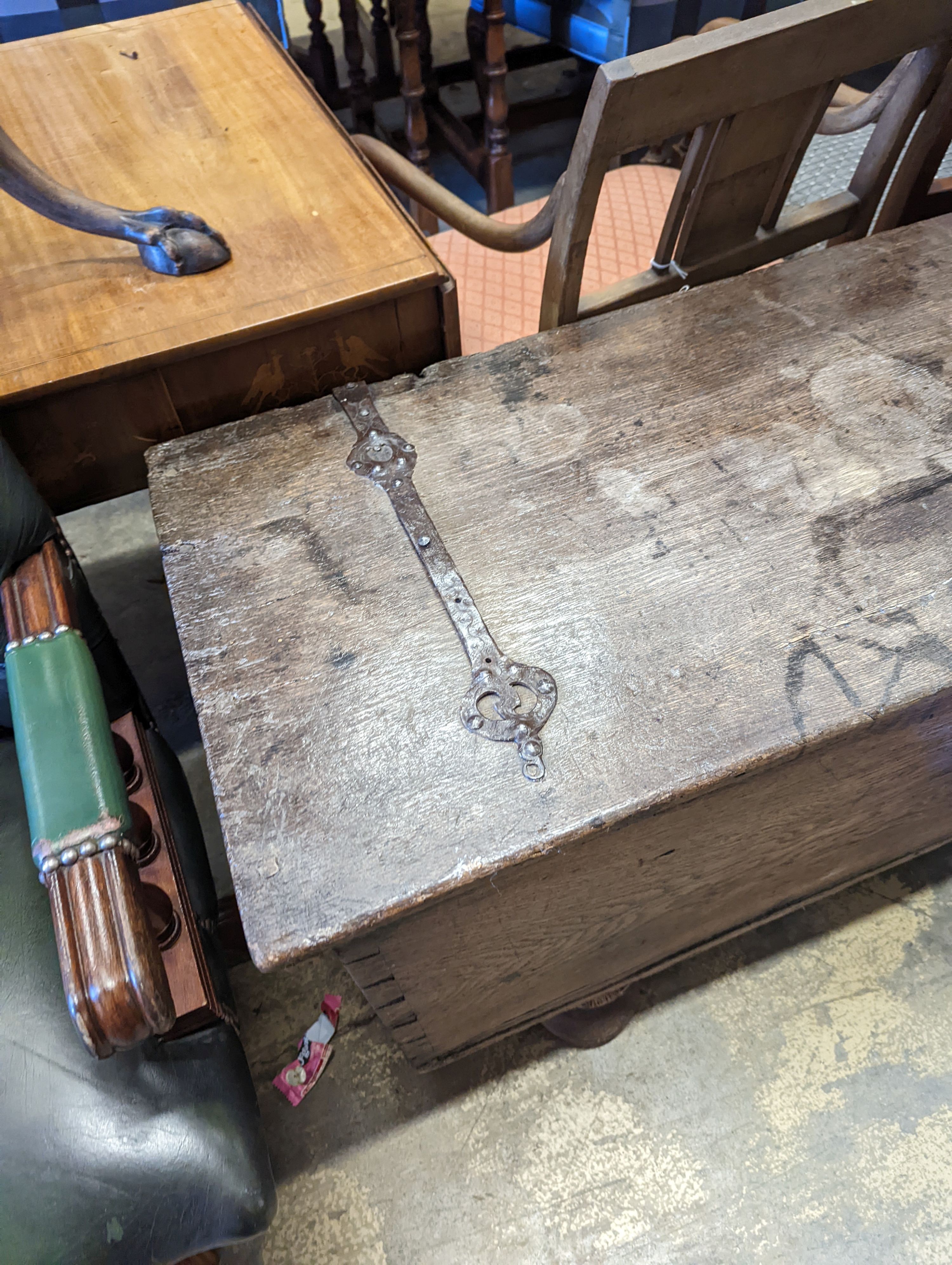 An 18th century Continental wrought iron mounted oak coffer, on pad feet, length 124cm, depth 50cm, height 66cm